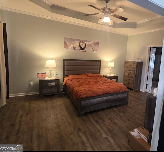345 Oak Springs Dr NW, Lawrenceville, GA 30043 - bedroom with a tray ceiling, wood finished floors, ornamental molding, baseboards, and a ceiling fan