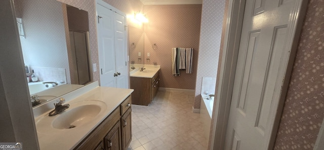 345 Oak Springs Dr NW, Lawrenceville, GA 30043 - bathroom featuring two vanities, wallpapered walls, a bath, tile patterned floors, and baseboards