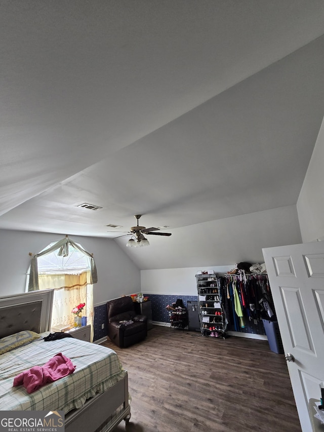 345 Oak Springs Dr NW, Lawrenceville, GA 30043 - bedroom featuring vaulted ceiling, wood finished floors, and ceiling fan