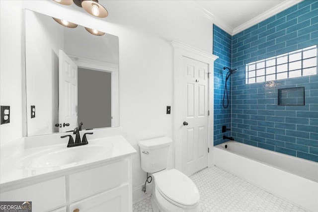 bathroom with toilet, tub / shower combination, vanity, and ornamental molding