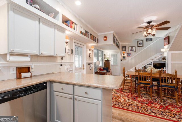 0 Vinson Mountain Rd, Rockmart, GA 30153 - kitchen featuring ceiling fan, crown molding, stainless steel dishwasher, light wood-type flooring, and a peninsula