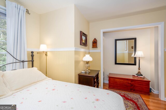 0 Vinson Mountain Rd, Rockmart, GA 30153 - bedroom with wood finished floors and a wainscoted wall