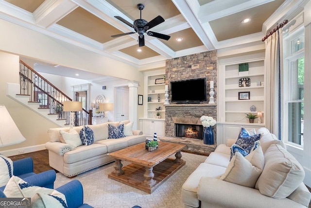 5475 Copper Creek Pass, Cumming, GA 30040 - living area with coffered ceiling, a ceiling fan, beam ceiling, baseboards, and stairs