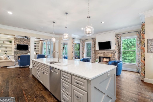 5475 Copper Creek Pass, Cumming, GA 30040 - kitchen with a stone fireplace, open floor plan, a sink, stainless steel dishwasher, and crown molding