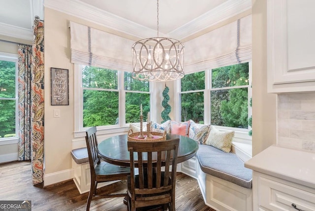 5475 Copper Creek Pass, Cumming, GA 30040 - dining room with a chandelier, baseboards, crown molding, dark wood-type flooring, and healthy amount of natural light