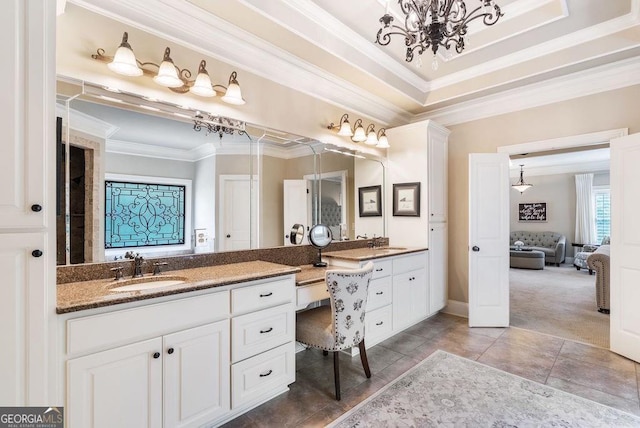 5475 Copper Creek Pass, Cumming, GA 30040 - ensuite bathroom featuring ornamental molding, vanity, a chandelier, baseboards, and tile patterned flooring
