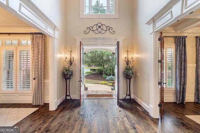 5475 Copper Creek Pass, Cumming, GA 30040 - foyer entrance with wood finished floors, a towering ceiling, and baseboards
