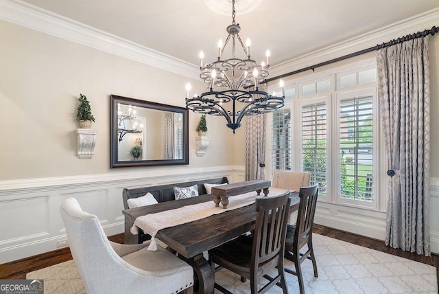 5475 Copper Creek Pass, Cumming, GA 30040 - dining space with a chandelier, wainscoting, wood finished floors, and ornamental molding