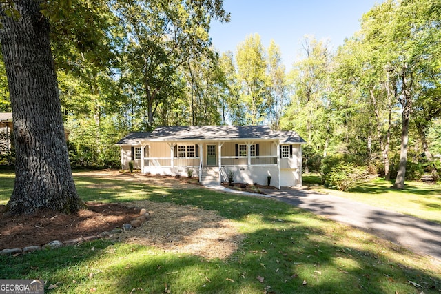 2690 Old Hickory Dr NW, Marietta, GA 30064 - ranch-style house with a porch, board and batten siding, and a front lawn