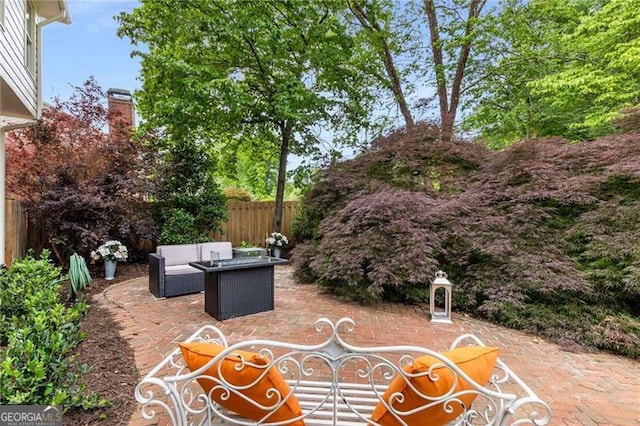 view of patio / terrace featuring a fenced backyard and an outdoor hangout area