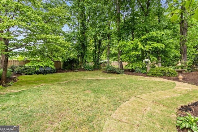 view of yard featuring fence