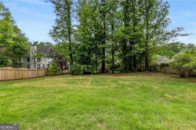 view of yard with fence
