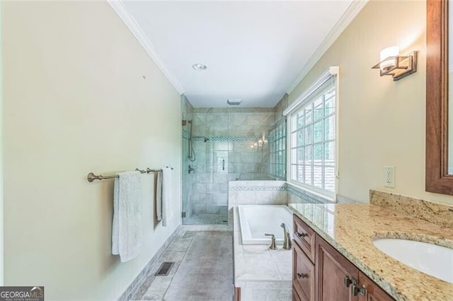 bathroom with vanity, visible vents, ornamental molding, a bath, and a stall shower