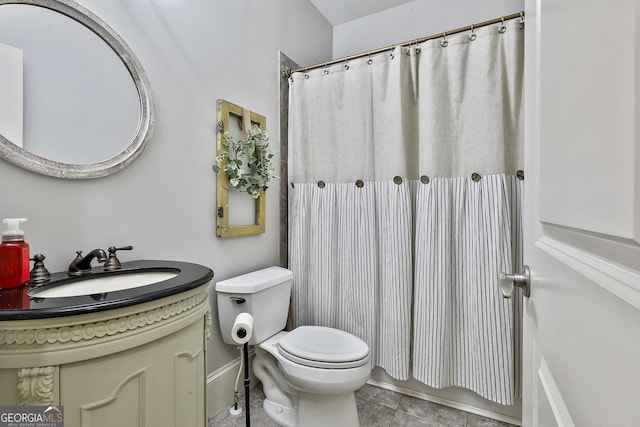 255 Ashmere Ct, Tyrone, GA 30290 - bathroom featuring vanity, toilet, tile patterned floors, curtained shower, and baseboards