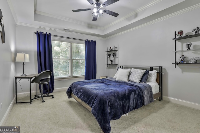 255 Ashmere Ct, Tyrone, GA 30290 - bedroom featuring carpet flooring, baseboards, ornamental molding, a tray ceiling, and a ceiling fan