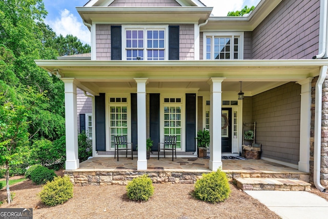 entrance to property with a porch