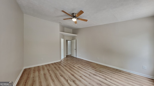 1229 Huntington Place Cir, Lithonia, GA 30058 - unfurnished room with baseboards, a ceiling fan, and wood finished floors