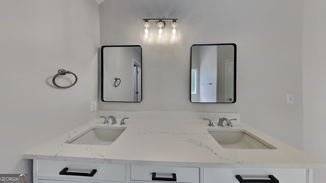 1229 Huntington Place Cir, Lithonia, GA 30058 - bathroom featuring double vanity and a sink