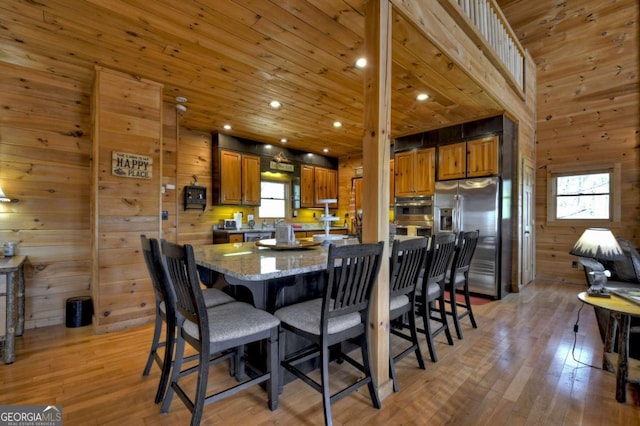 143 Katydid Rd, Morganton, GA 30560 - dining room featuring wooden walls, recessed lighting, wood ceiling, and light wood finished floors