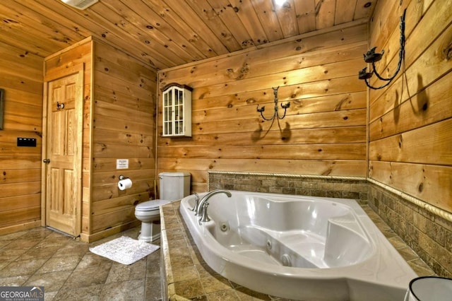 143 Katydid Rd, Morganton, GA 30560 - bathroom featuring toilet, wood walls, wooden ceiling, and a whirlpool tub