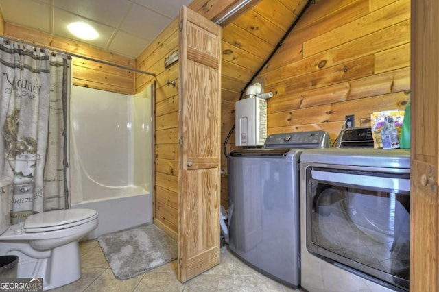 143 Katydid Rd, Morganton, GA 30560 - full bath featuring separate washer and dryer, tile patterned floors, wooden walls, and toilet
