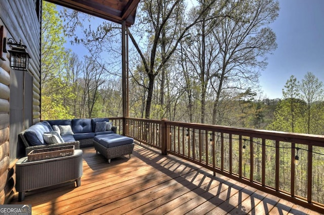 143 Katydid Rd, Morganton, GA 30560 - wooden terrace featuring an outdoor living space and a wooded view