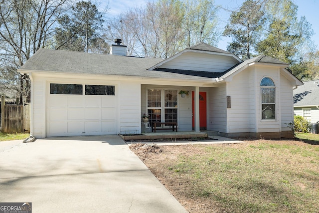 single story home featuring fence, covered porch, a chimney, an attached garage, and driveway