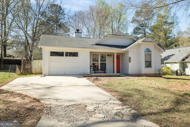 view of front of house featuring fence, a garage, a porch, a chimney, and concrete driveway