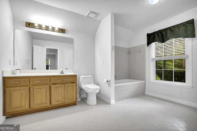 full bath with baseboards, toilet, tiled shower / bath combo, tile patterned floors, and vaulted ceiling