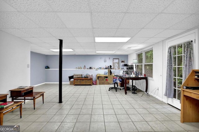 home office featuring a paneled ceiling