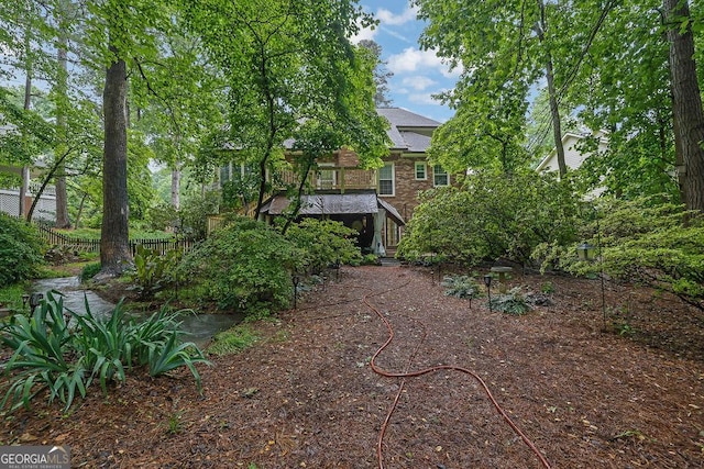 view of yard featuring fence