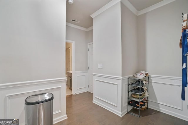 317 Basel Way, Hampton, GA 30228 - hall featuring ornamental molding, a decorative wall, wood finished floors, and a wainscoted wall