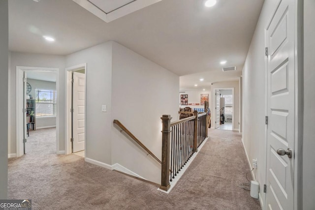 317 Basel Way, Hampton, GA 30228 - hall featuring an upstairs landing, light carpet, and recessed lighting