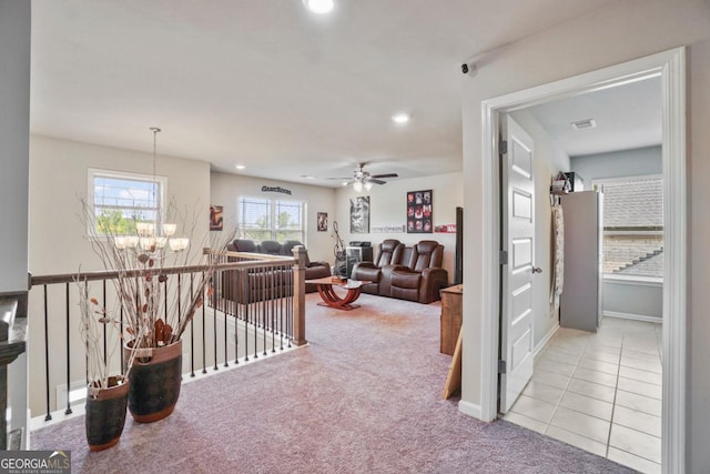 317 Basel Way, Hampton, GA 30228 - corridor featuring carpet flooring, recessed lighting, a chandelier, an upstairs landing, and tile patterned floors
