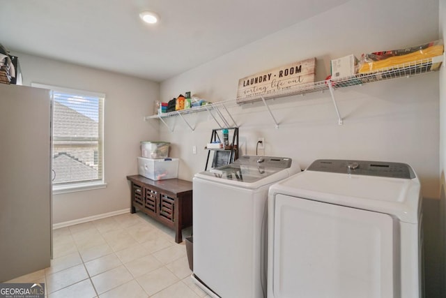 317 Basel Way, Hampton, GA 30228 - laundry area featuring independent washer and dryer, light tile patterned floors, and recessed lighting