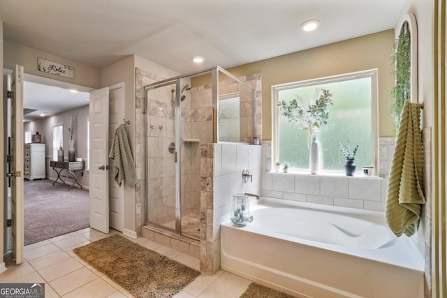 317 Basel Way, Hampton, GA 30228 - bathroom with a bath, a shower stall, tile patterned floors, and recessed lighting