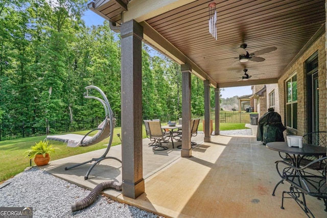 317 Basel Way, Hampton, GA 30228 - view of patio / terrace with outdoor dining area and ceiling fan