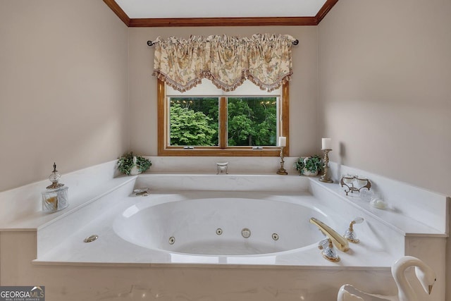 bathroom with a jetted tub and crown molding