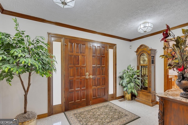 foyer with crown molding and baseboards