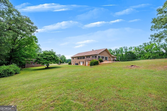 view of yard featuring a garage