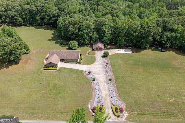 bird's eye view with a forest view