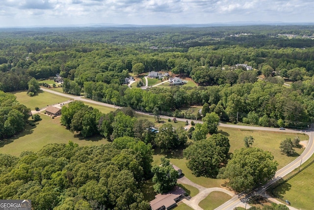 aerial view with a wooded view