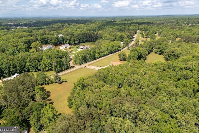 drone / aerial view with a view of trees