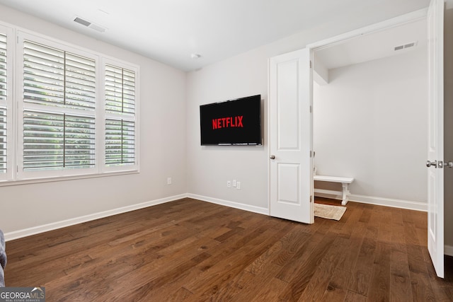 10200 Windalier Way, Roswell, GA 30076 - unfurnished bedroom featuring visible vents, baseboards, and wood finished floors