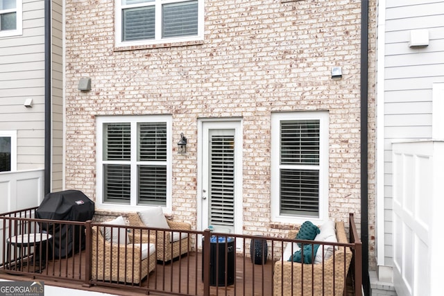 10200 Windalier Way, Roswell, GA 30076 - deck with an outdoor hangout area, a grill, and central AC