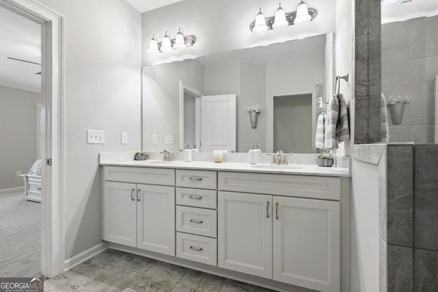 10200 Windalier Way, Roswell, GA 30076 - full bathroom featuring double vanity, a sink, baseboards, and tiled shower
