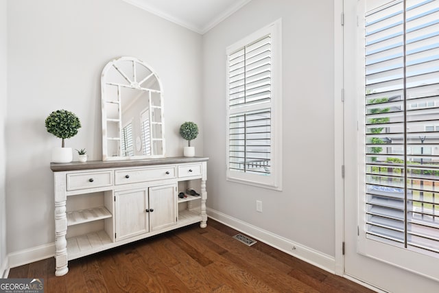 10200 Windalier Way, Roswell, GA 30076 - entryway with crown molding, baseboards, dark wood finished floors, and a healthy amount of sunlight