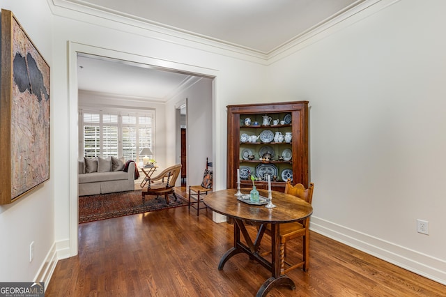 1717 N Decatur Rd NE Unit 214, Atlanta, GA 30307 - dining area with crown molding, baseboards, and wood finished floors
