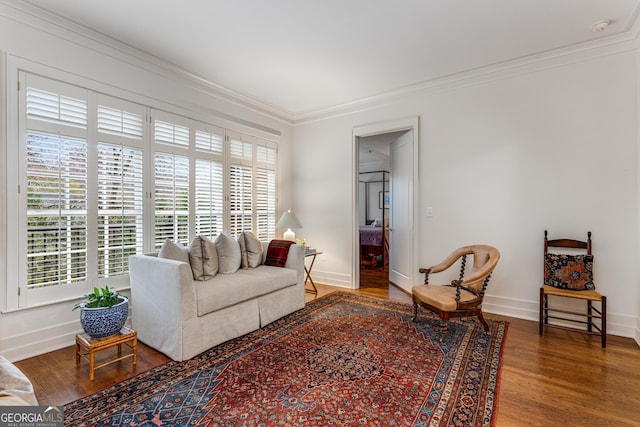 1717 N Decatur Rd NE Unit 214, Atlanta, GA 30307 - living area with crown molding, a healthy amount of sunlight, and wood finished floors