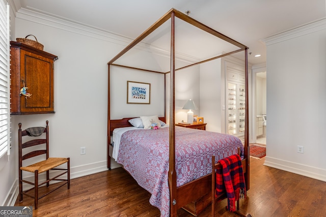 1717 N Decatur Rd NE Unit 214, Atlanta, GA 30307 - bedroom featuring baseboards, ornamental molding, recessed lighting, and wood finished floors